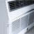 GE AJCQ08AWJ - Built-In Thru the Wall Smart Air Conditioner with 3-Speed Fan in Close-Up View