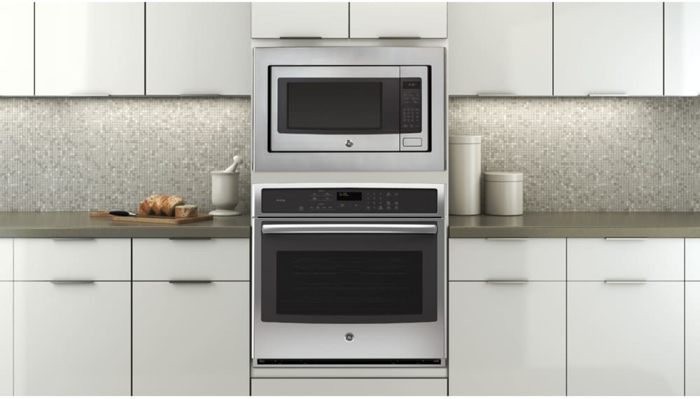 GE Profile™ 1.1 Cu. Ft. White Countertop Microwave, East Coast Appliance