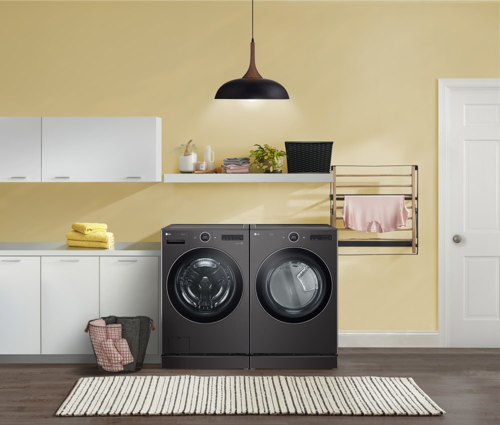 Black Steel Smart Side by Side Front Load Laundry Pair with WM6700HBA 27 Washer and DLGX6701B 27 GAS