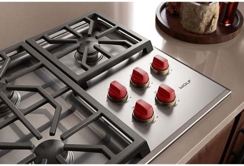 Wolf 9061697 - 36" Professional Gas Cooktop Brushed Brass Bezel Kit