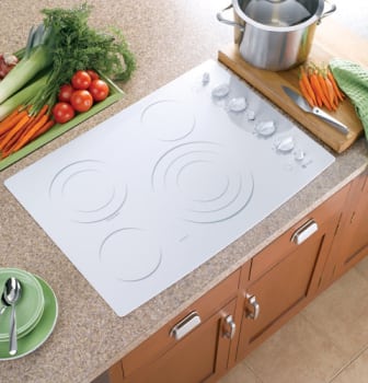 GE JP626WKWW 36 Inch Electric Cooktop with 4 Coil Elements, Removable Drip  Bowls, Upfront Controls and ADA Compliant: White