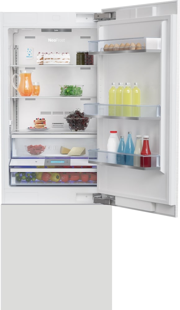 Integrated fridge freezer with ice maker and water dispenser top