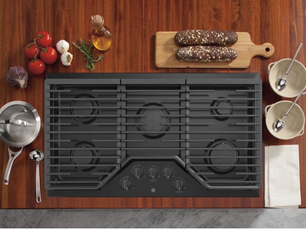 GE JGP5036SLSS 36 Built In Gas Cooktop with 5 Sealed Burners Dishwasher Safe Continuous Grates Max Burner System Power Boil Burner Griddle Simmer