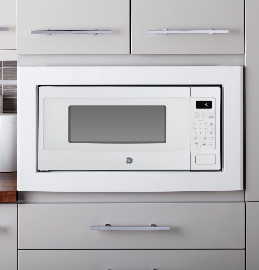 GE PCHK11S1WWW 1.1 cu. ft. Countertop Microwave Oven with 800 Watts Sensor Cooking Weight Time Defrost Glass Turntable Optional Hanging Kit Optional Built In Trim Kit and ADA Compliant White