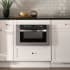 ZLINE MWD1 - ZLINE 24 in. 1.2 cu. ft. Built-in Microwave Drawer in Stainless Steel (MWD-1) embedded in a kitchen with white cabinets and black countertop. 24 in. 1.2 cu. ft. Built-in Microwave Drawer in Stainless Steel