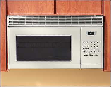 Magic Chef Cmv1100aaq 1 5 Cu Ft Over The Range Microwave Oven With Vent Magic Chef Cmv1100aaq Main