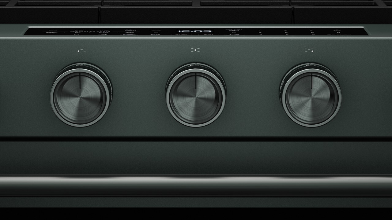 Close-up of three front control knobs and top touch control panel