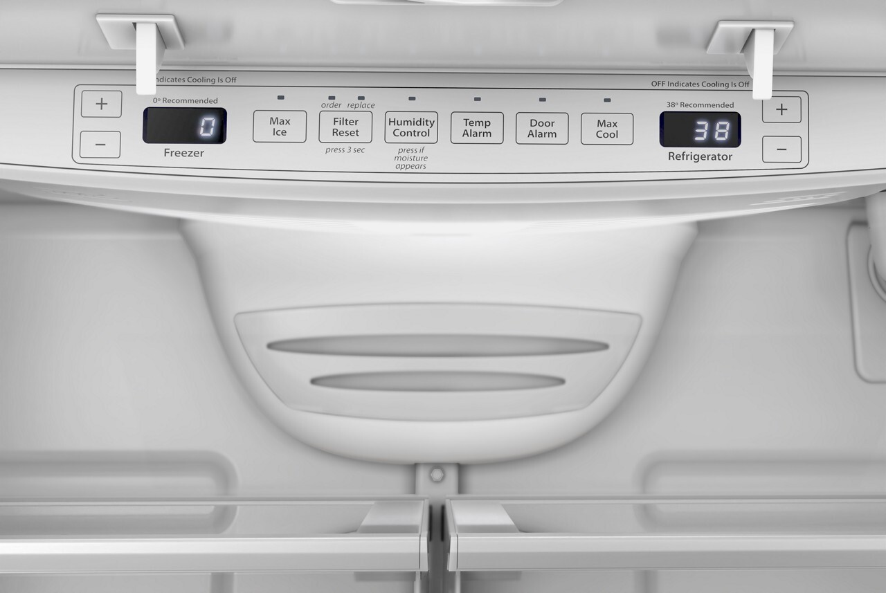 Close-up of the refrigerator interior control panel with temperature displays and buttons for Max Ice, Filter Reset, Humidity Control, Temp Alarm, Door Alarm, and Max Cool